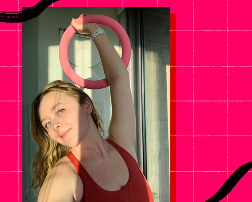 woman holding bala pink power ring 